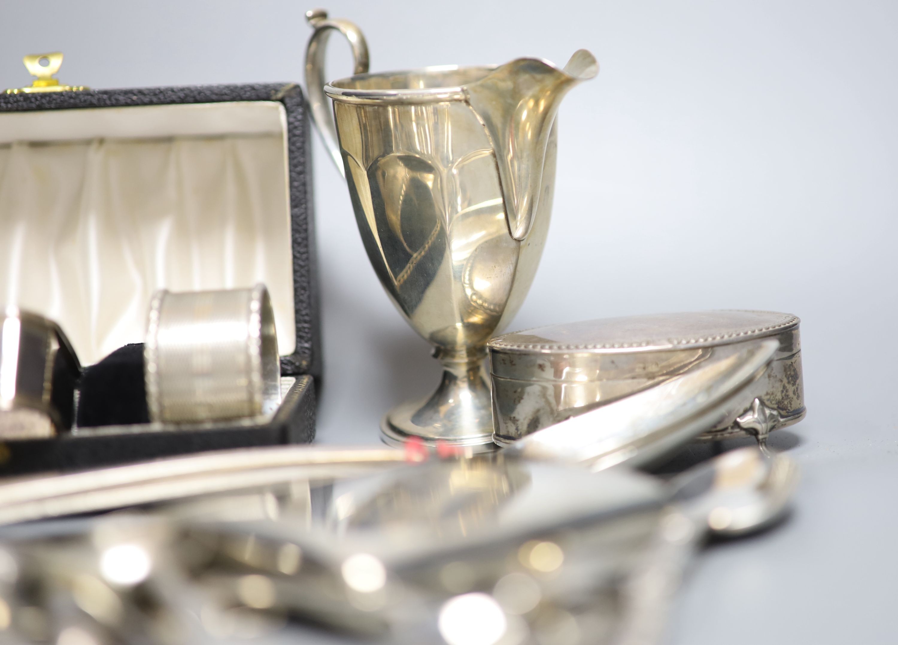 Sundry silver and plated items including flatware, sugar nips, small bowl, ashtray, cigarette case, pepperette, trinket box etc. weighable silver 31oz.